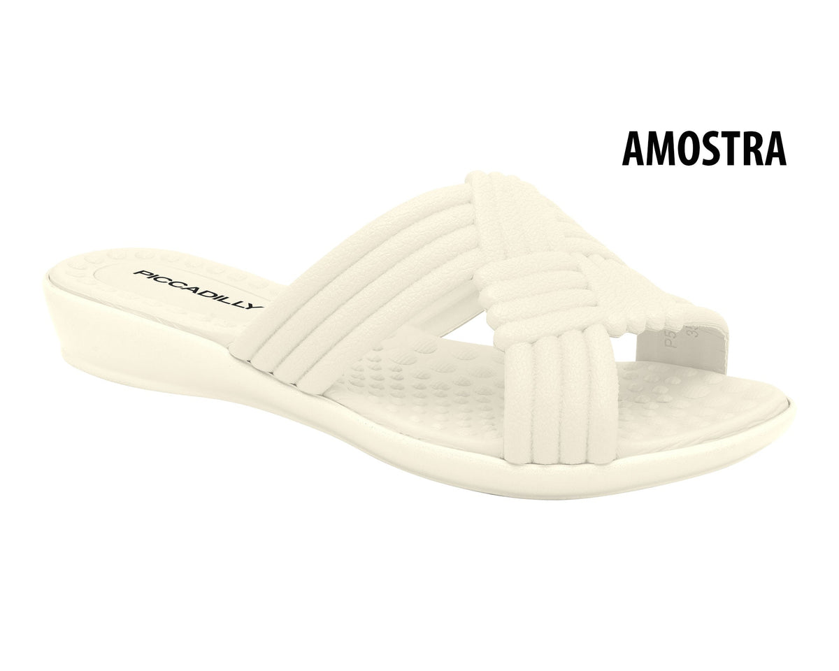 The Piccadilly Brazilian 502001 features a white slip-on design with crisscrossed padded straps, low wedge heel, and Marsh-Mila 'Marshmallow' EVA Memory Foam Sole. "AMOSTRA" is in bold black text on the right side.