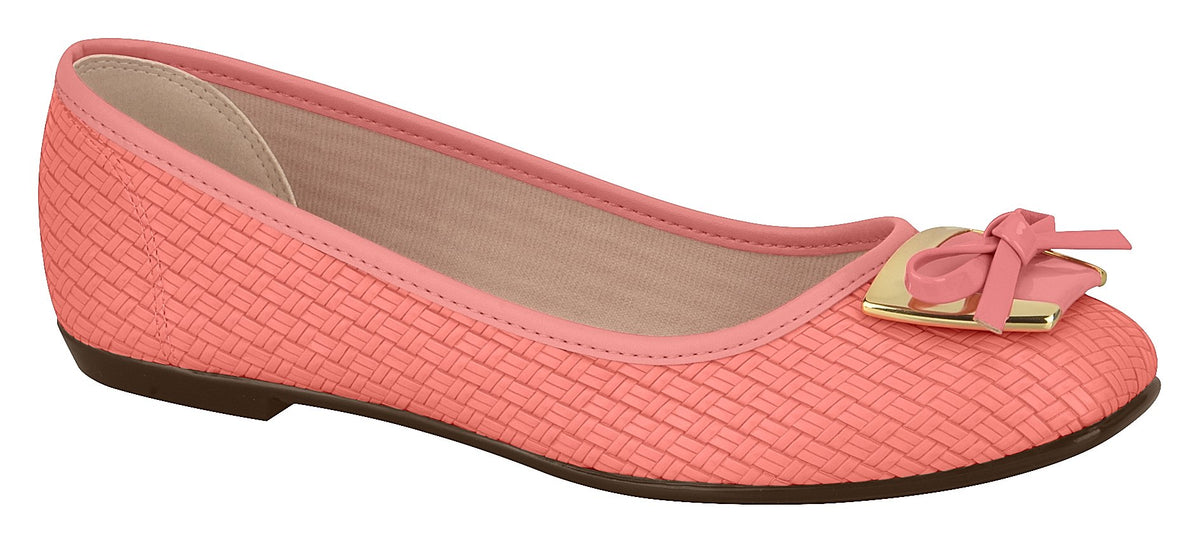 The Moleca 5255.635 Women Fashion Flats in Coral Neo feature a pink woven texture, a gold and pink bow on the toe, and a brown sole for trendy, stylish comfort.