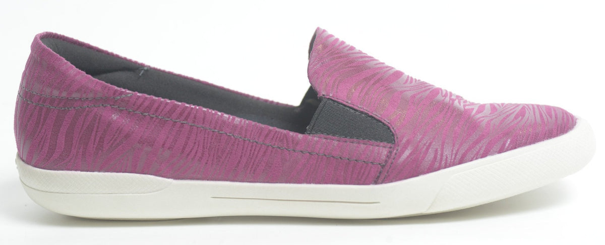 The Piccadilly 961001-742 Women Tennis Shoe Casual Wine features a slip-on design in wine, subtle textured patterns, a white non-slip rubber sole, black elastic side panels for comfort and style, shown on a white background.