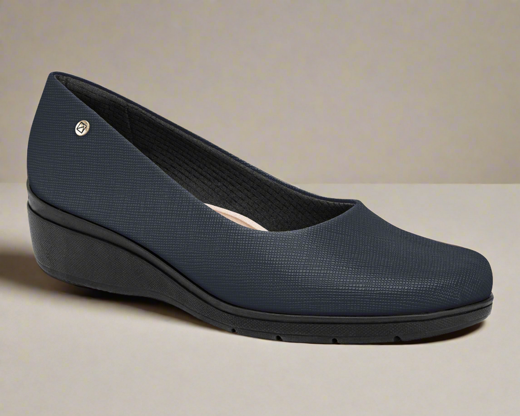 Piccadilly Ref: 117115-10 Business Shoe in Navy with Mid Wedge is here to elevate your professional wardrobe with the perfect blend of elegance and comfort.