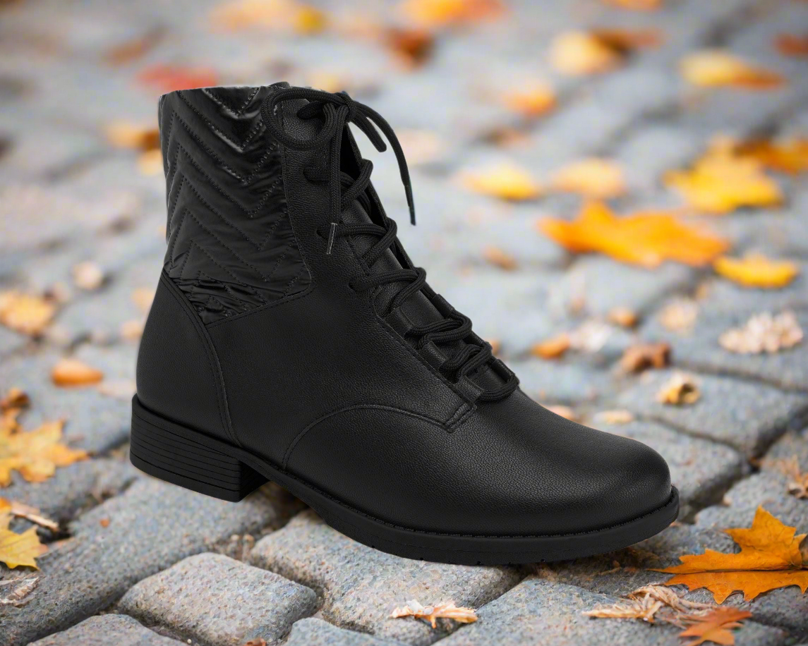 Embody sophistication with the striking allure of the 653004-01 Piccadilly Low Heel Ankle Boot in Soft Black